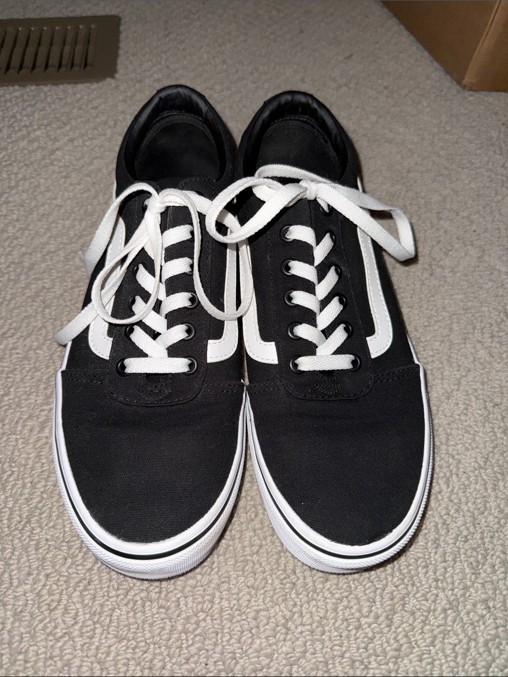 Womens Black and White Vans Low-Top Sneakers
